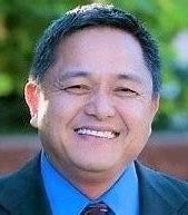 Portrait of Hermy Almonte, Realtor DRE#02065602.